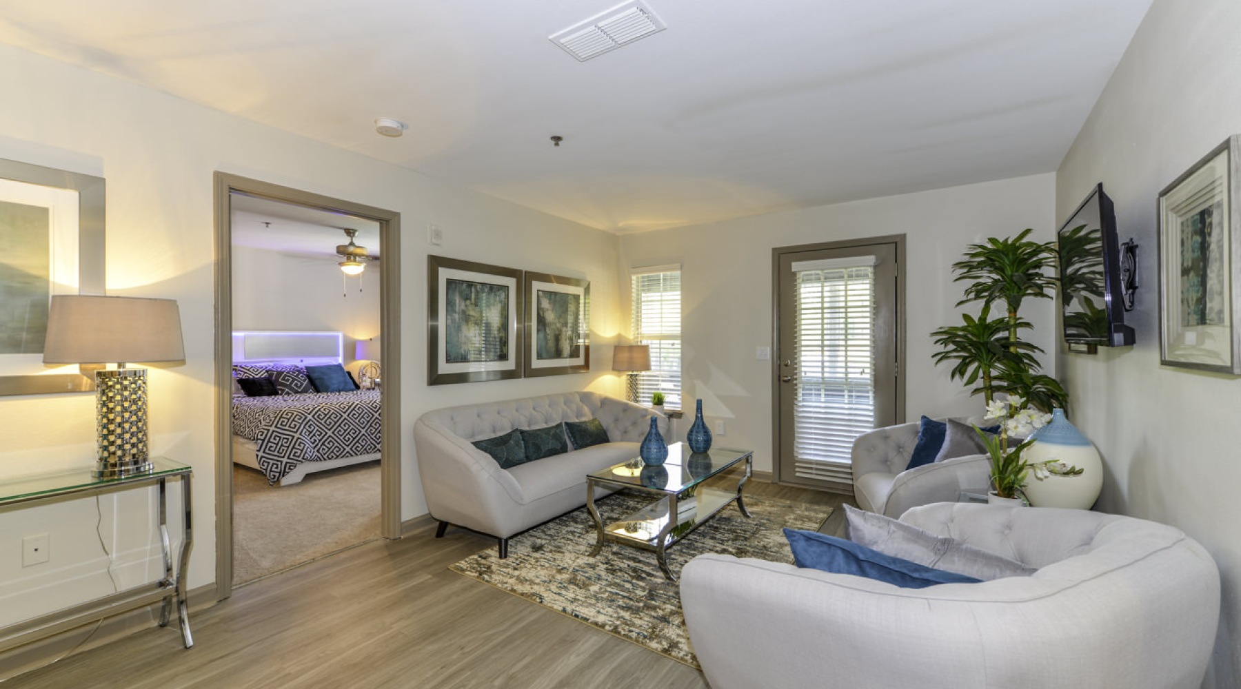 a living room with a large mirror