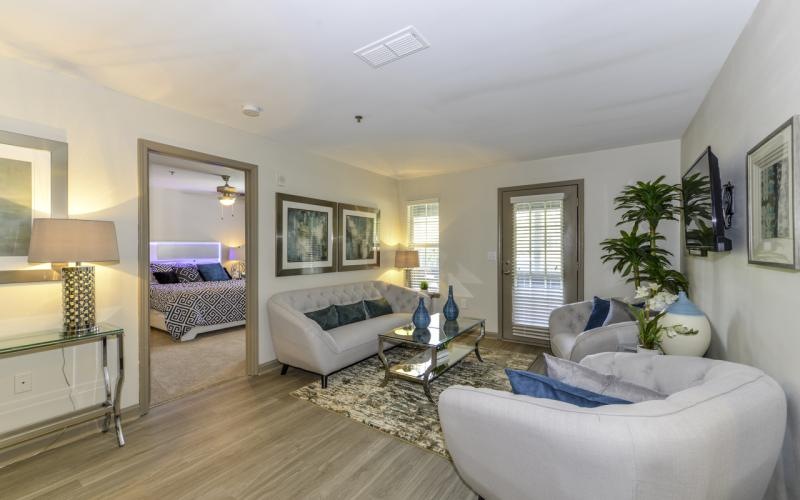a living room with a large mirror
